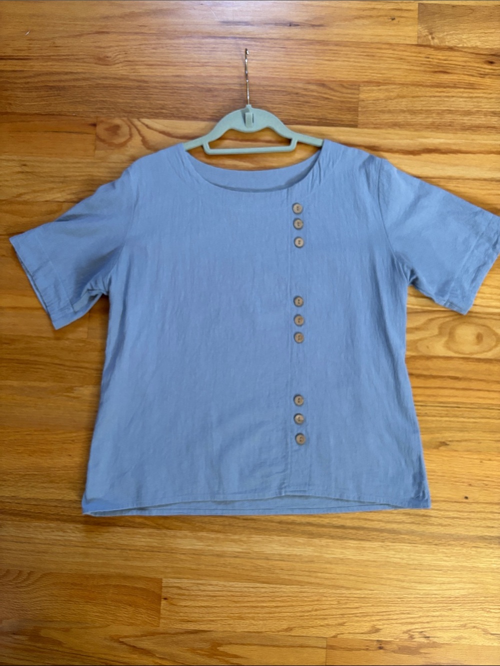 Relaxed Light Blue Short-Sleeve Top with Button Detail
